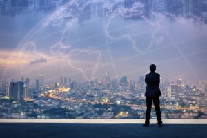 man looking at city