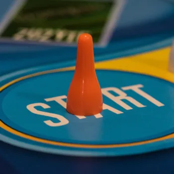 orange coloured counter at start of a board game